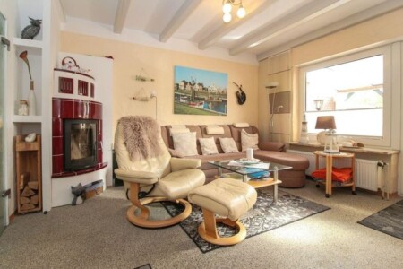 Foto 1 Ferienwohnung Ostfriesland Krummhörn & Umgebung Giselas Grachtenblick (Objekt 89485) buchen