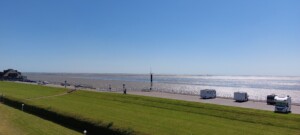 Exklusive Ferienwohnung am Südstrand mit Wintergarten, Balkon & Meerblick | Wohnung 22
