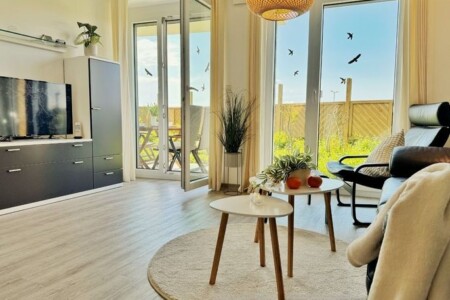 Foto 2 Ferienwohnung Ostfriesland Zwischen Elbe und Weser De Tuunkrüper mit Deichblick Nordseeluft von der Terrasse aus (Objekt 101275) buchen