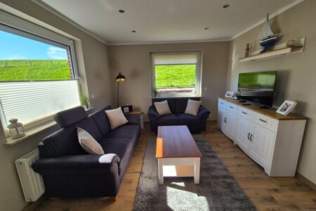 Foto 1 Ferienwohnung Ostfriesland Butjadingen Lüttjes Diekhuus (Objekt 94590) buchen