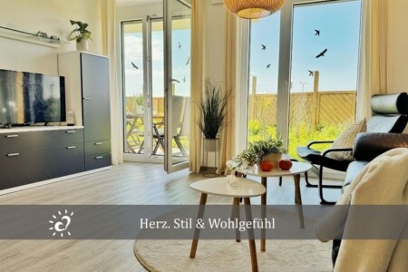 Foto 1 Ferienwohnung Ostfriesland Zwischen Elbe und Weser Ferienwohnung De Tuunkrüper mit Deichblick Nordseeluft von der Terrasse aus (Objekt 101275) buchen